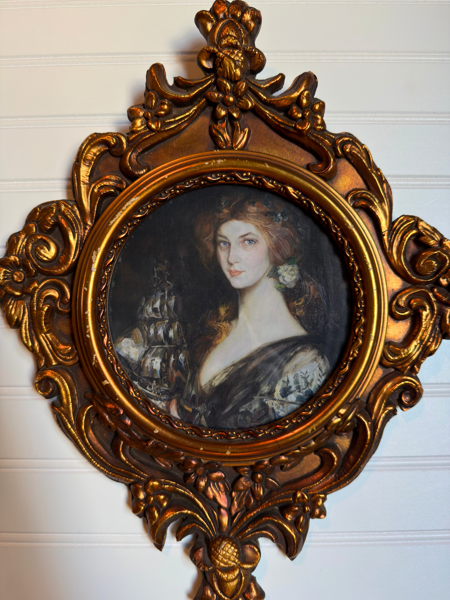 Framed Lady Holding a Ship Print