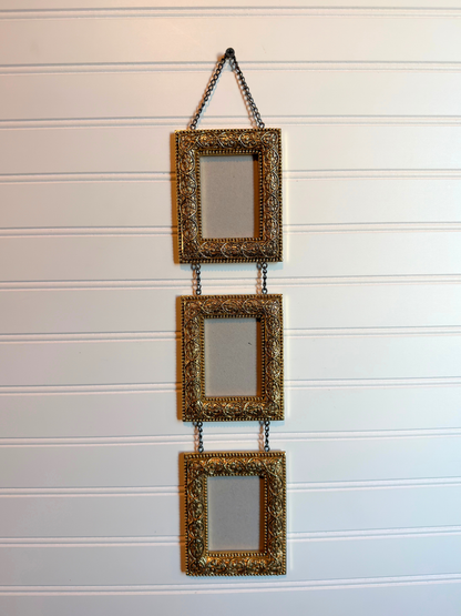 Gold Ornate Frames Connected By Chain