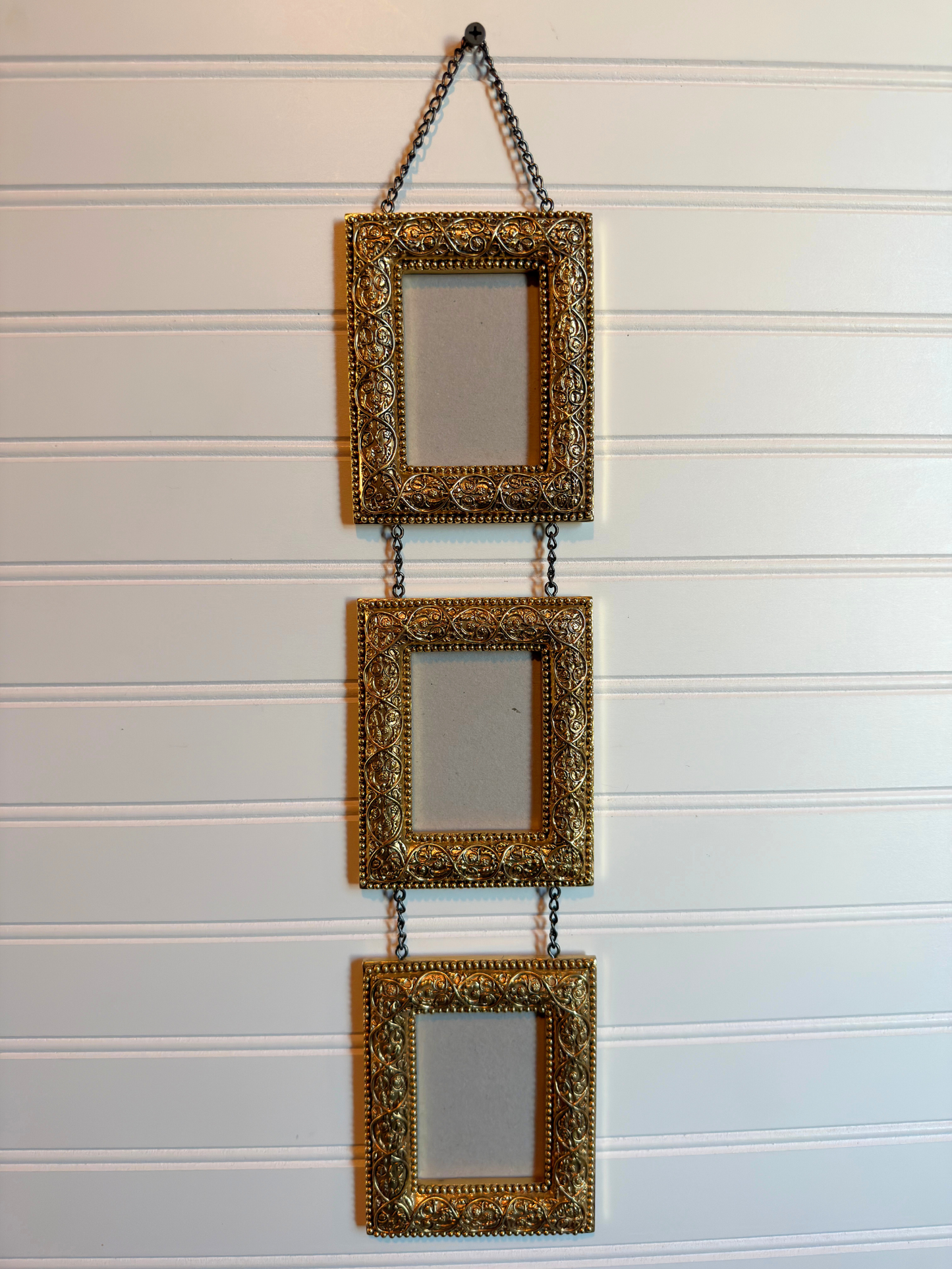 Gold Ornate Frames Connected By Chain
