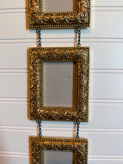 Gold Ornate Frames Connected By Chain