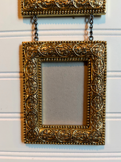 Gold Ornate Frames Connected By Chain