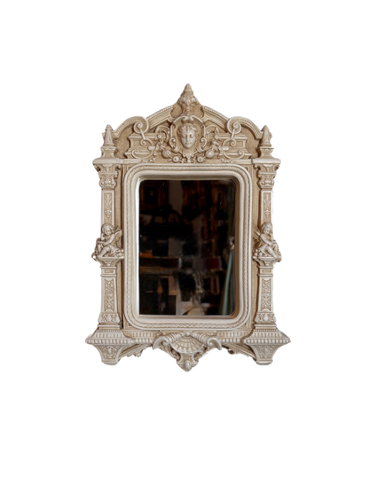 Ornate Figural Mirror