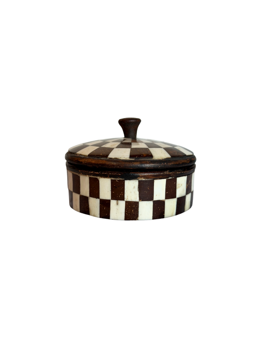 Decorative checkered lidded box on a white background