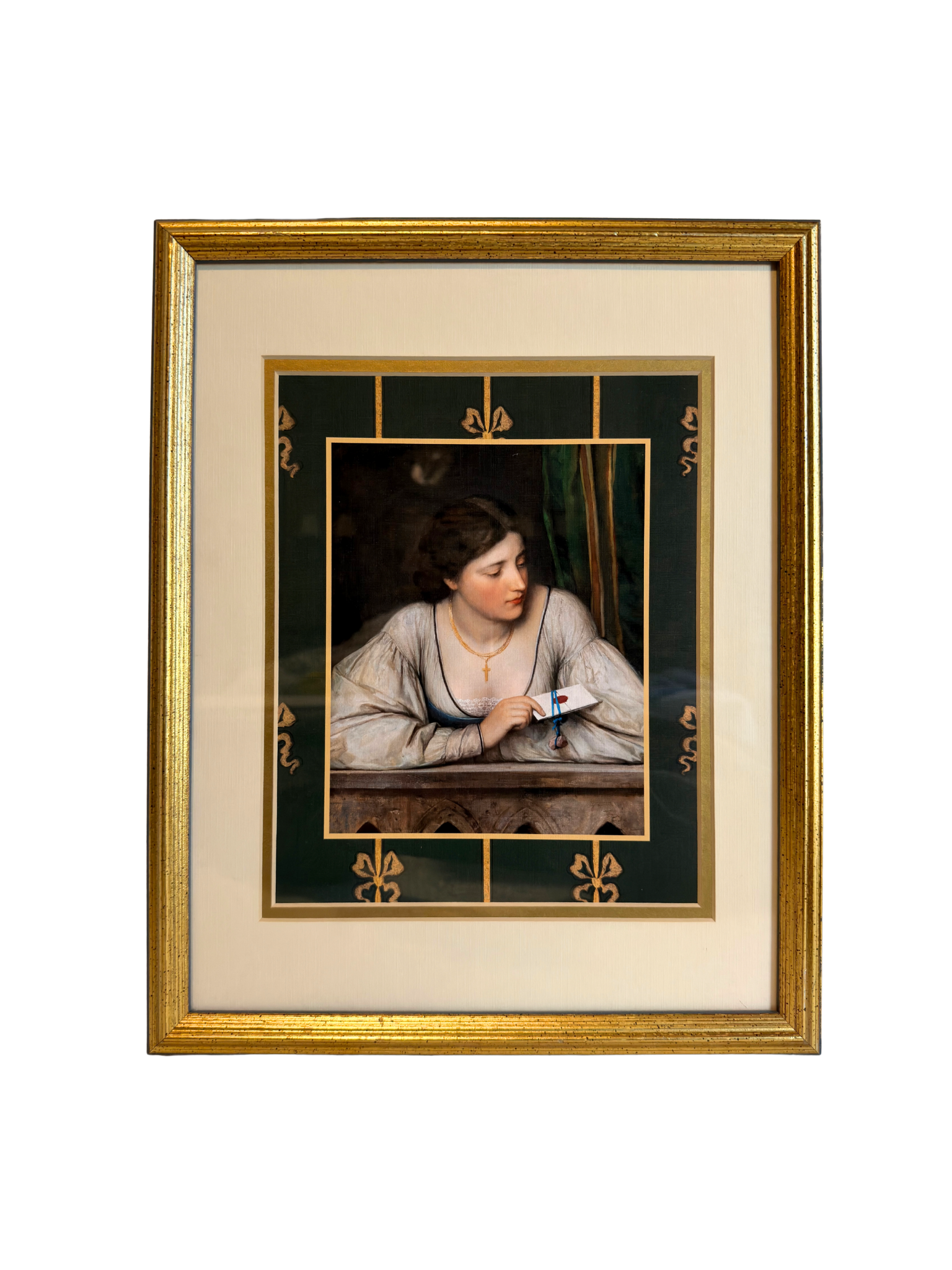 Framed artwork of a woman holding a letter with decorative gold frame and green border with bows.