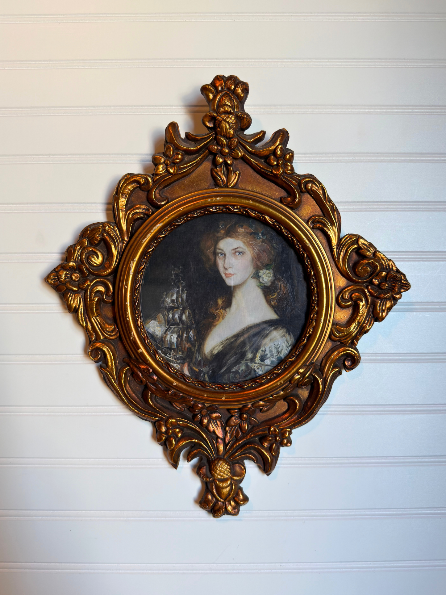 Framed Lady Holding a Ship Print