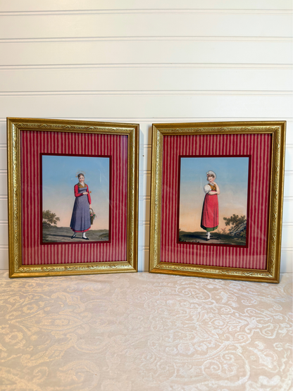 Two framed portraits of a woman in traditional attire on a striped red and white background.