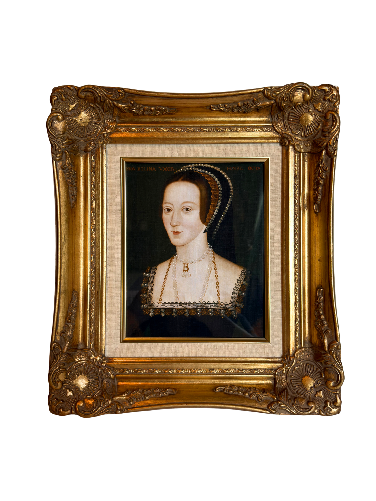 Anne Boleyn portrait in a gold frame on a white background
