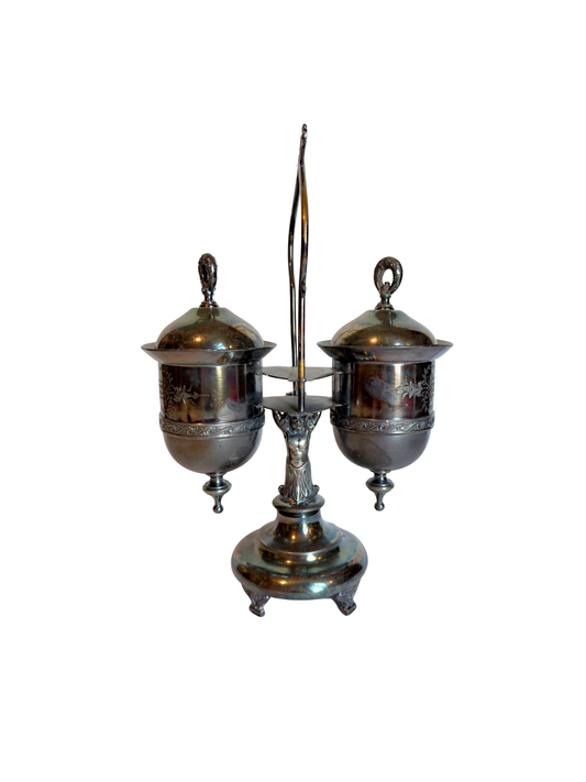 Double Silver plated Pickle castor with a figural lady on a white background