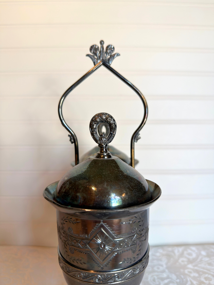 Double Silver plated Pickle castor with a figural lady on a white background