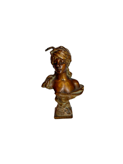 Small statue of girl on a white background