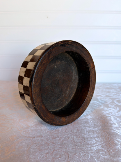 inside of Checkered box on a textured surface