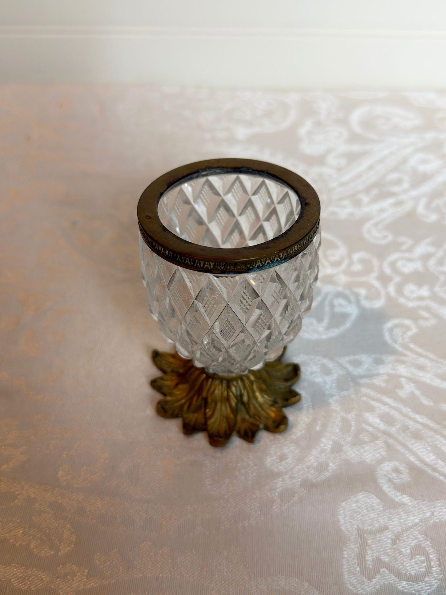 Decorative crystal  match holder with matches on a white background