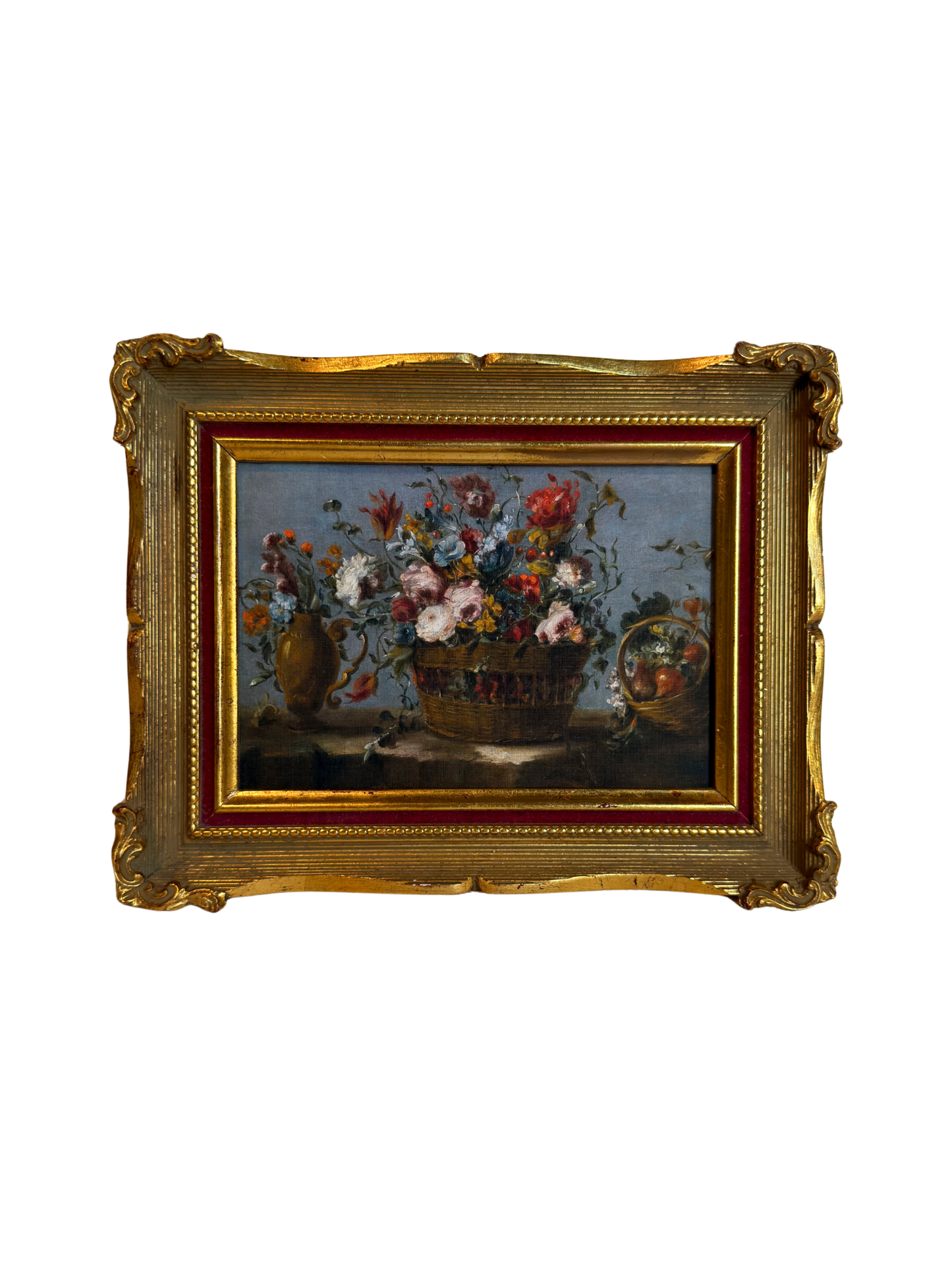 Framed print of flowers in a basket on a white background